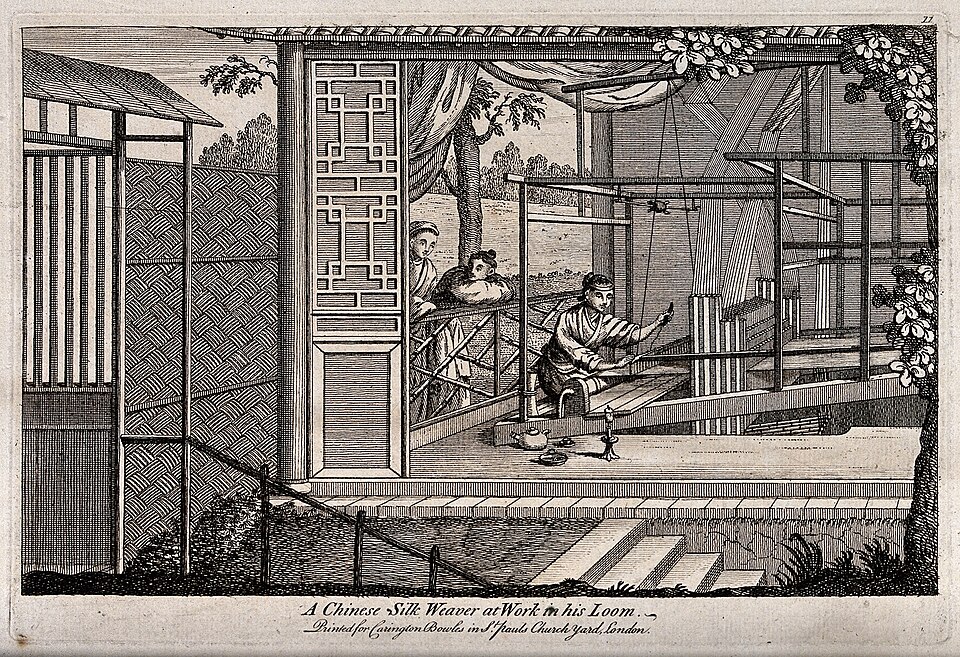 A Chinese silk weaver at work on a figured loom, showing the tall frame with warp threads under tension and the weaving mechanism.