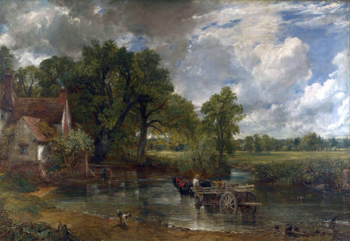 A horse-drawn hay wain crossing a shallow river beside a thatched cottage in the English countryside.