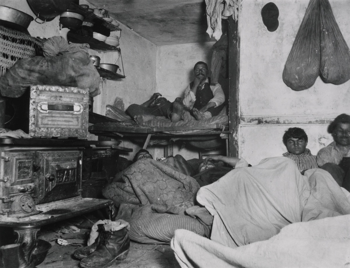 Crowded Lower East Side tenement lodgers caught in a flash photograph by Jacob Riis, circa 1889.